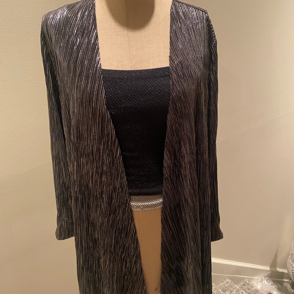 Black and silver foil evening jacket, beautiful paper thin ,stretchy. Stretchy.